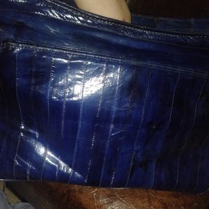 Lee Sands eel skin purse